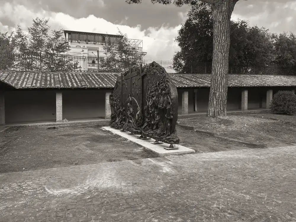 Installation of a bronze work in a courtyard in Castel Gandolfo